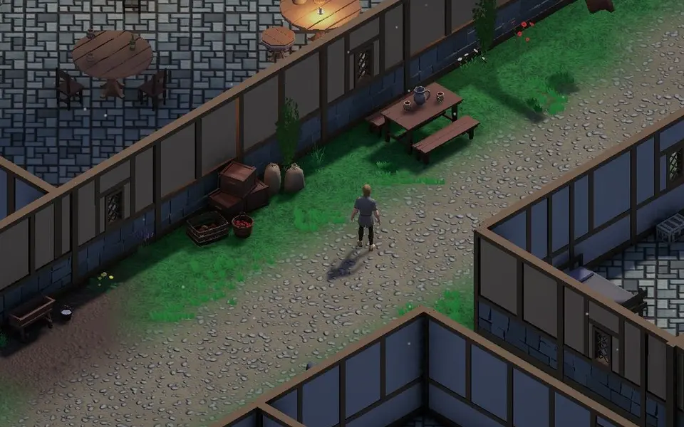 Une rue de Ravenholm dans le jeu : la terrasse de la taverne, une table à bancs et un personnage
