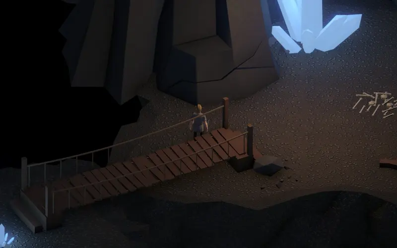 Un pont de corde au-dessus du gouffre, dans la caverne.